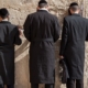 Haredi men praying at Kotel